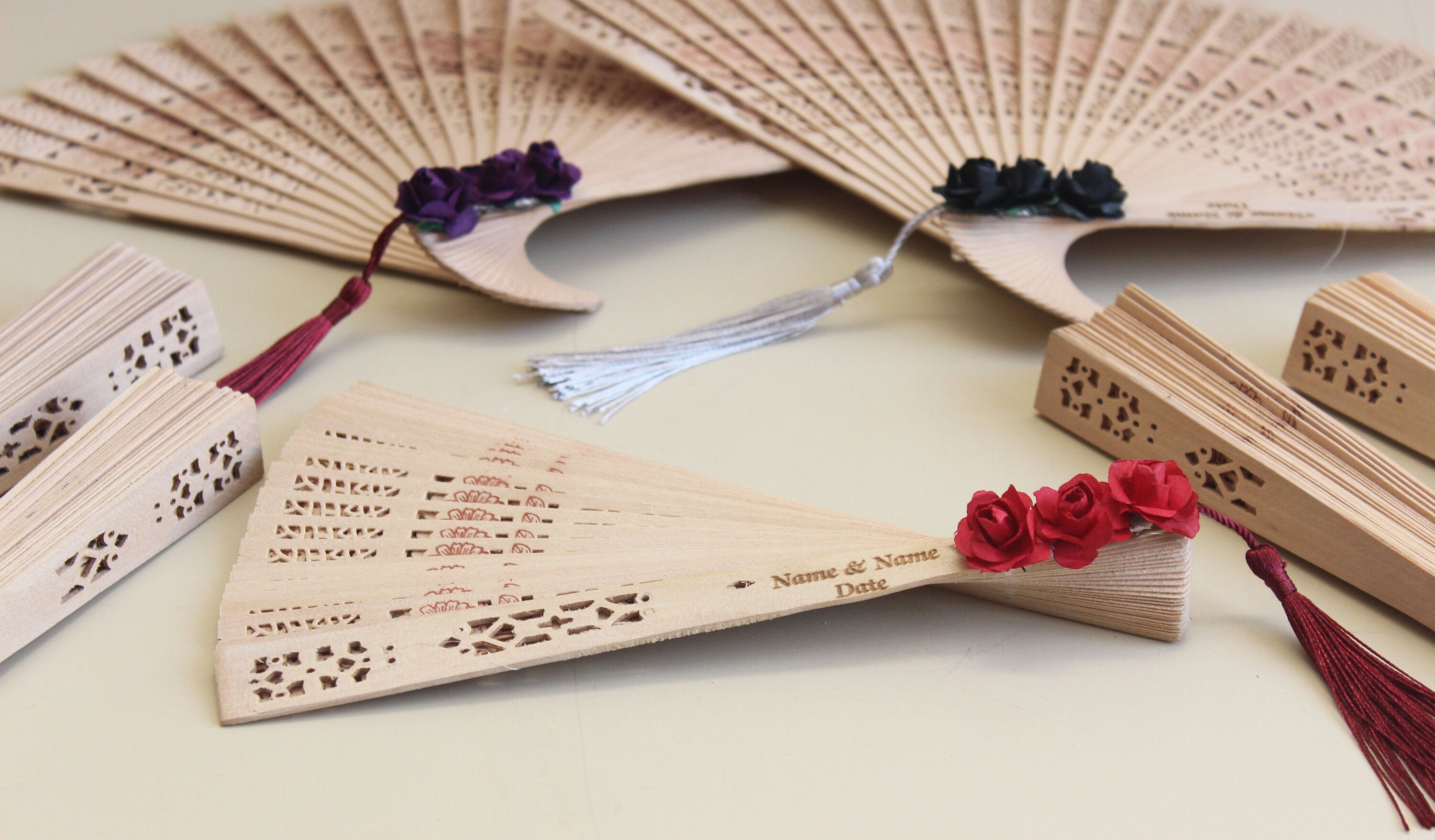 Personalized Bamboo Fan For Guest Favors With Three Paper Flower and Tassel Decorations