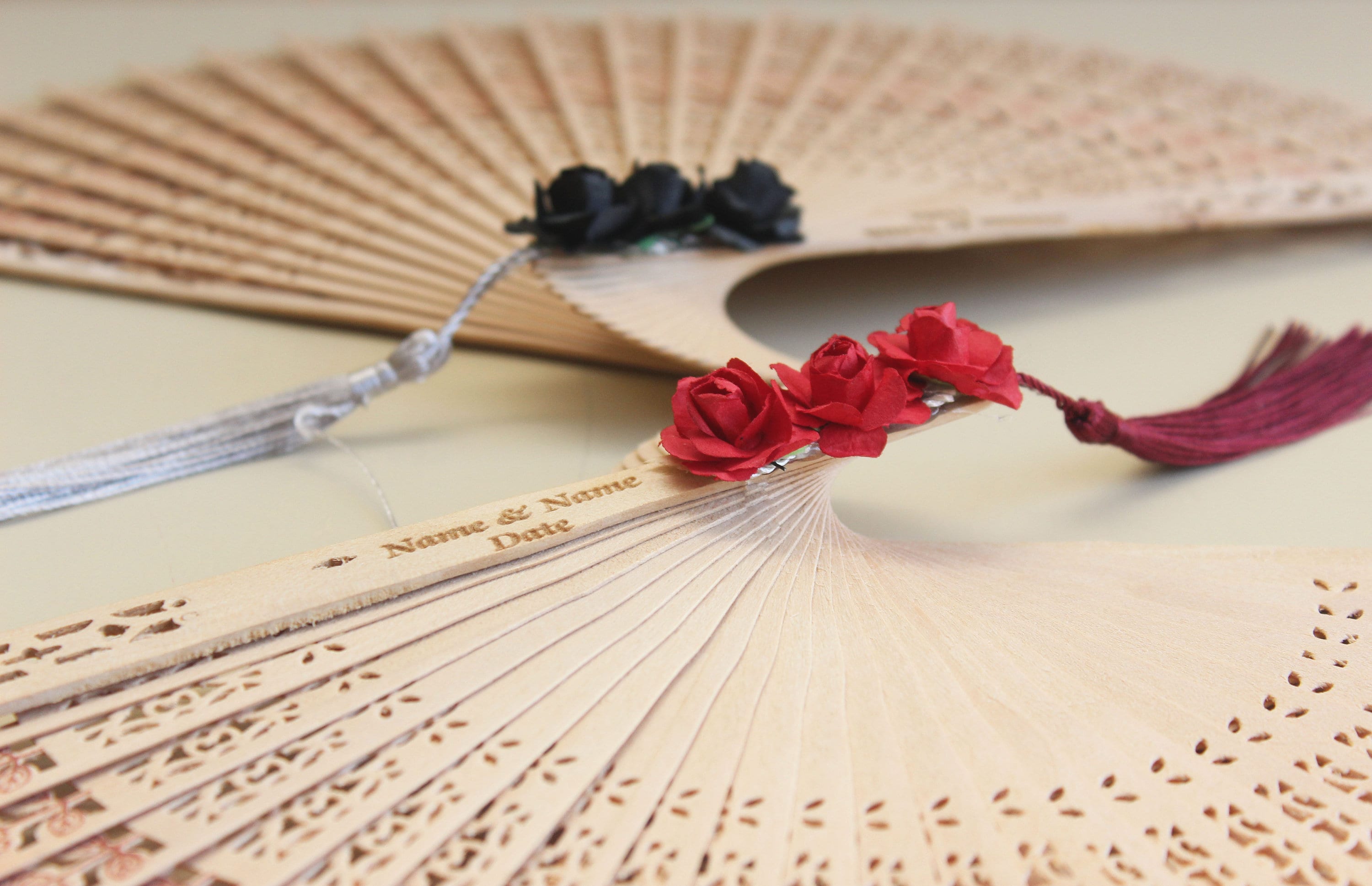 Personalized Bamboo Fan For Guest Favors With Three Paper Flower and Tassel Decorations