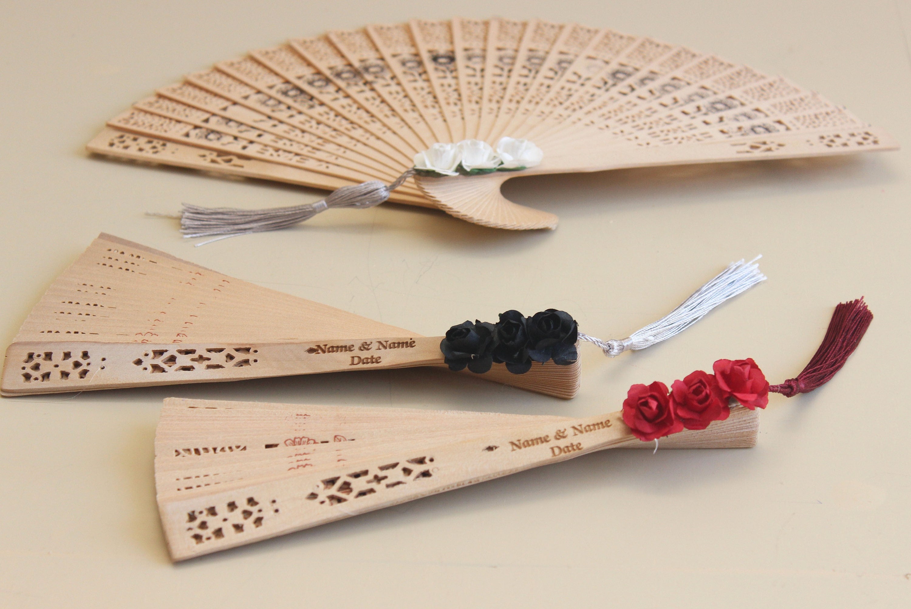 Personalized Bamboo Fan For Guest Favors With Three Paper Flower and Tassel Decorations